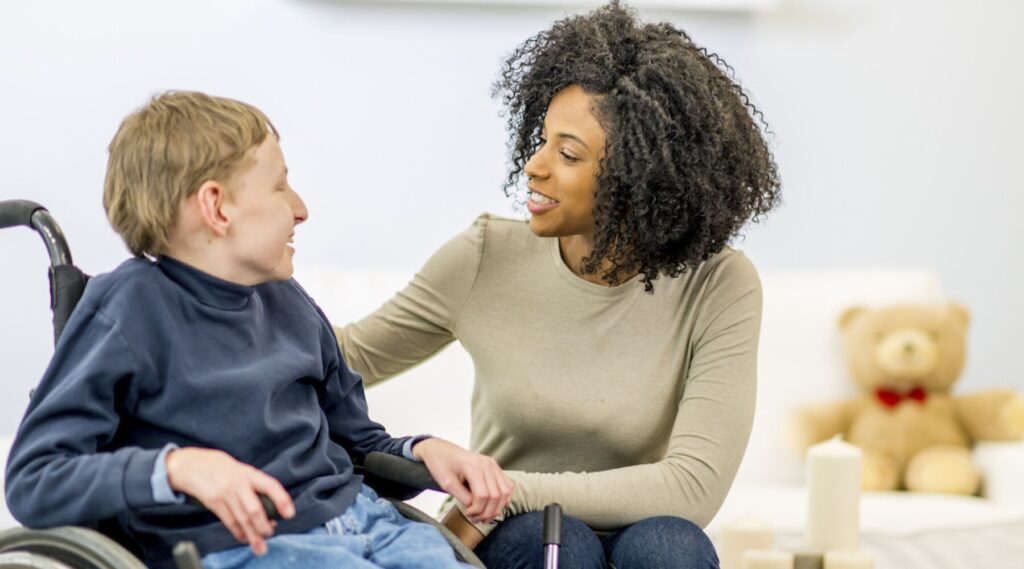 banner small boywheelchair girl